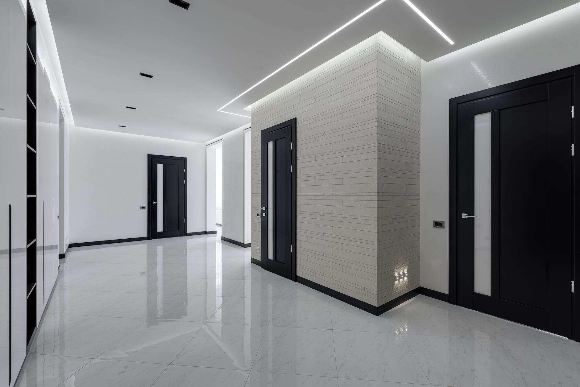 stylish white hall in big apartment building